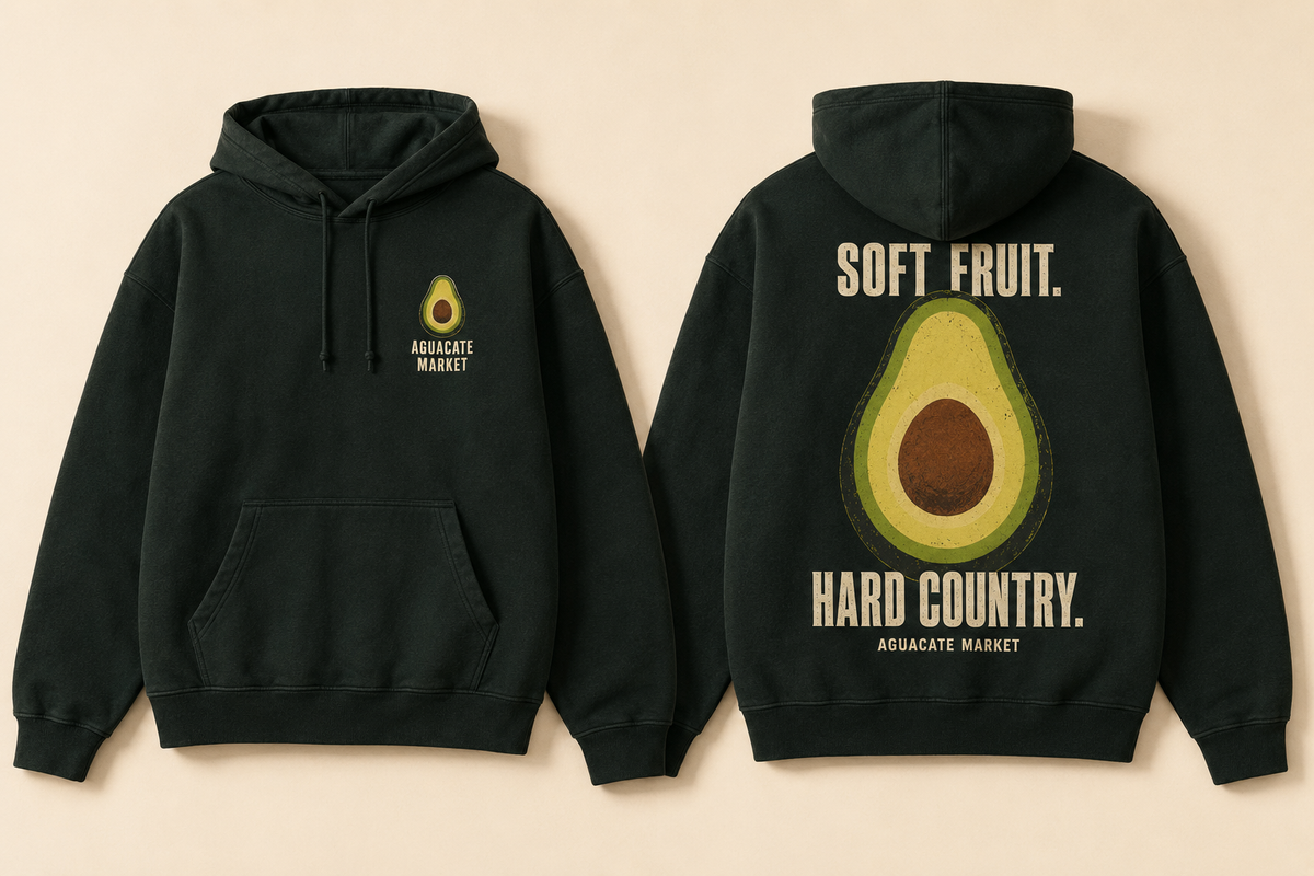 Dark green hoodie, front and back. Small chest mark, SOFT FRUIT. HARD COUNTRY. around a cut avocado across the back.